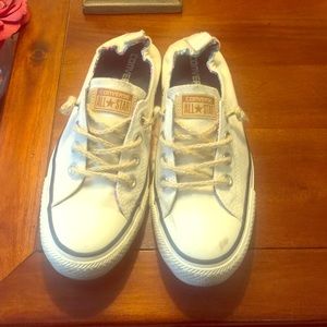 Cream slip on converse sneakers