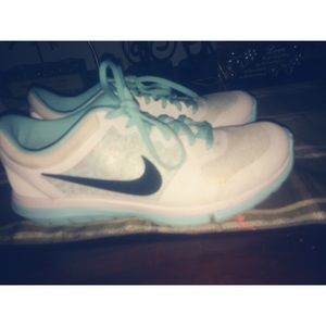 Nike baby blue and white shoes