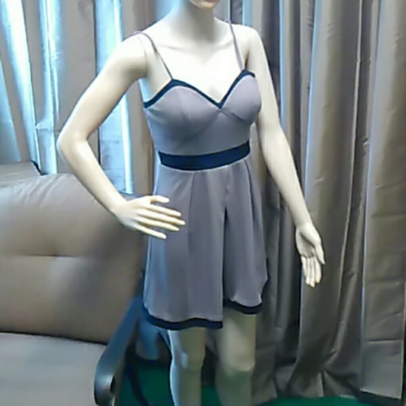 Cute dress  tan color with black trim