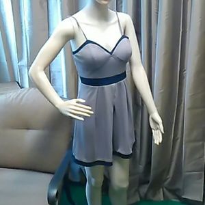 Cute dress  tan color with black trim