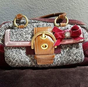 Vintage wool and leather coach handbag.