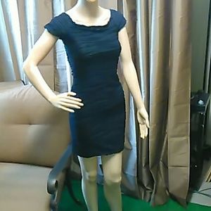 Cute black dress, stretchy but runs small.