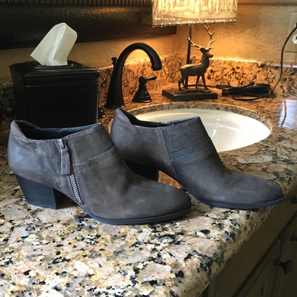 Never worn. Brown suede like leather ankle boots