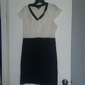 The limited ruffled neck dress