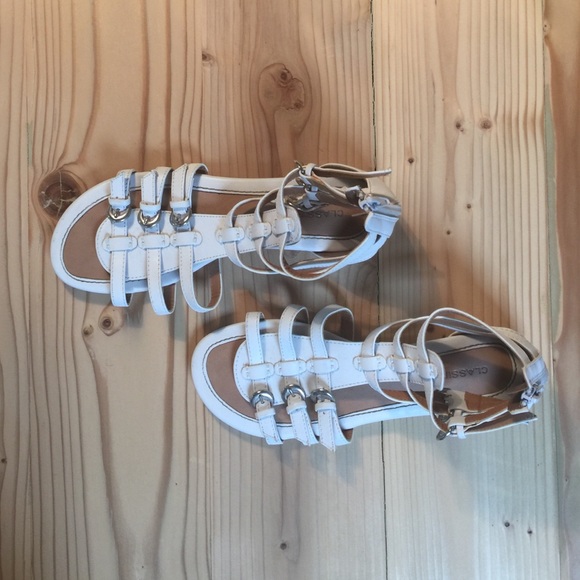 White strappy buckled gladiator sandals