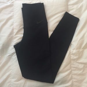 Nike legendary sculpt tight, black size small