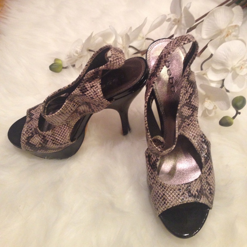 Bebe Maya snake skin cut-out platform sandals.
