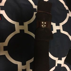 Brown and red belt with bow