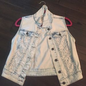 Light blue denim jacket with lace.