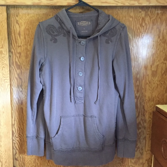 Maurice's brown hoody.