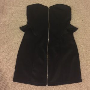 Strapless tight black dress with zipper in center