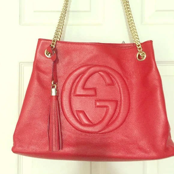 Red leather designer handbag
