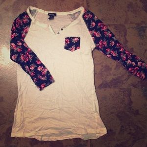 White and black baseball top with detailed sleeves