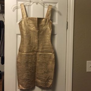 Gold Herve Leger bandage dress