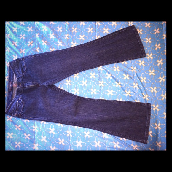 The limited size 10 boot cut jeans dark wash pants