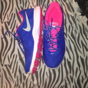 Pink and blue women's Nike running shoes