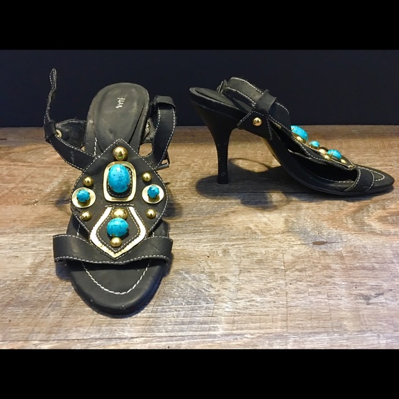 Faux Turquoise accented sandal.