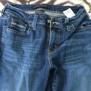 Levi mid-rise skinny jeans.