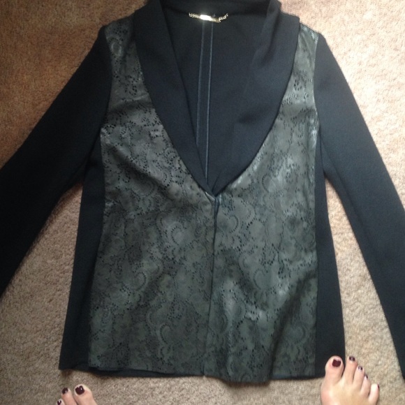 Unique sweater with stenciled button up front