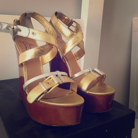 Badgley Mischka Wedged platform sandals.