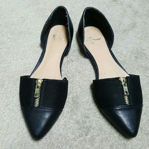 Black flats with gold zippers
