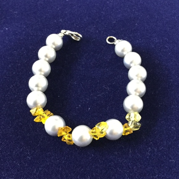 Silver Pearls & yellow/gold color beads bracelet .