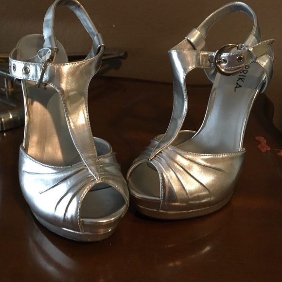 Never worn silver heels