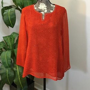 Lined orange sparkly top