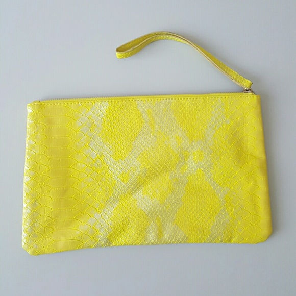 Accessorize yellow silver clutch bag