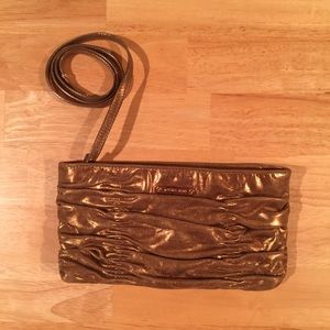 Michael Kors gold clutch