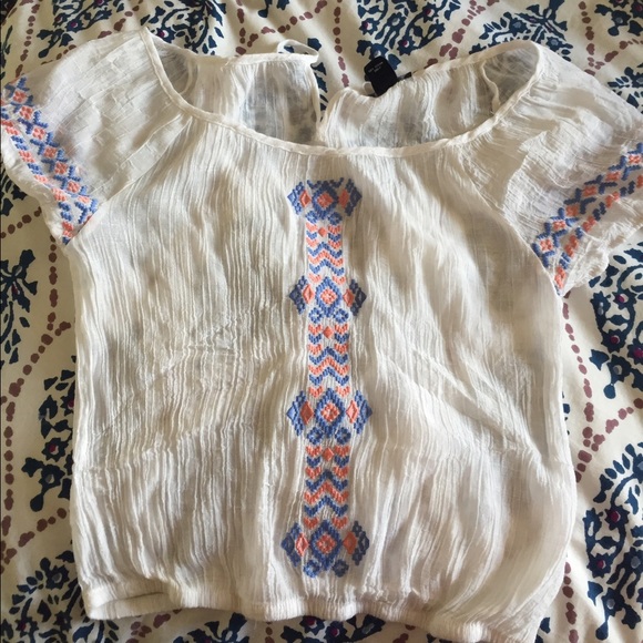 White shirt with tribal design
