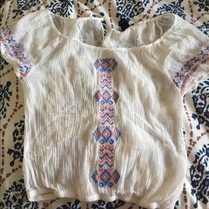 White shirt with tribal design