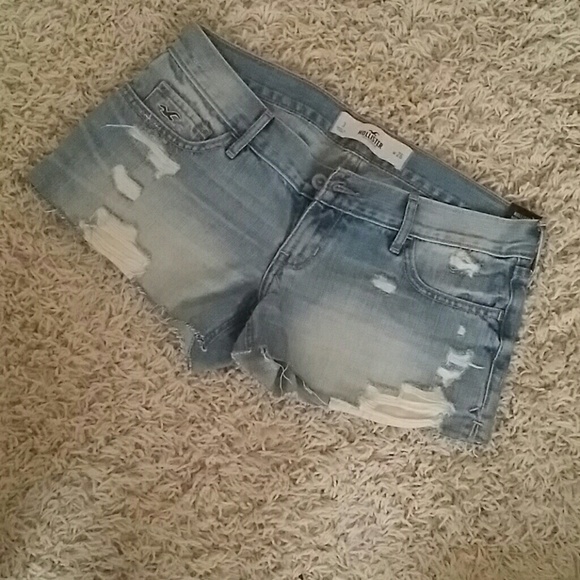 Distressed ripped denim or jean shorts