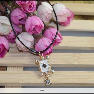 📍SOLD📍Ace charm pendant in leather string