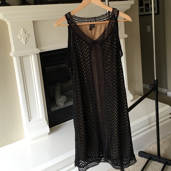 Black lace dress with nude lining.