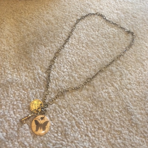 Butterfly & key cluster long chain necklace