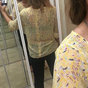 Sheer shirt with back button detail