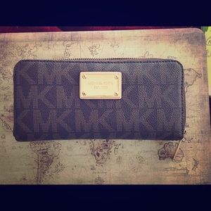 Large Michael Kors zip around wallet