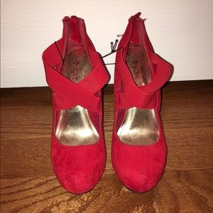 Red strap heels