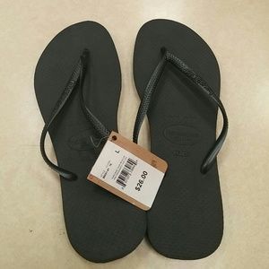 Black Havainanas flip flops (new with tags)
