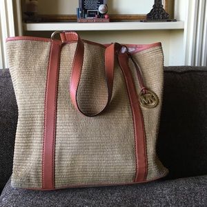 Michael Kors straw handbag with dark orange trim