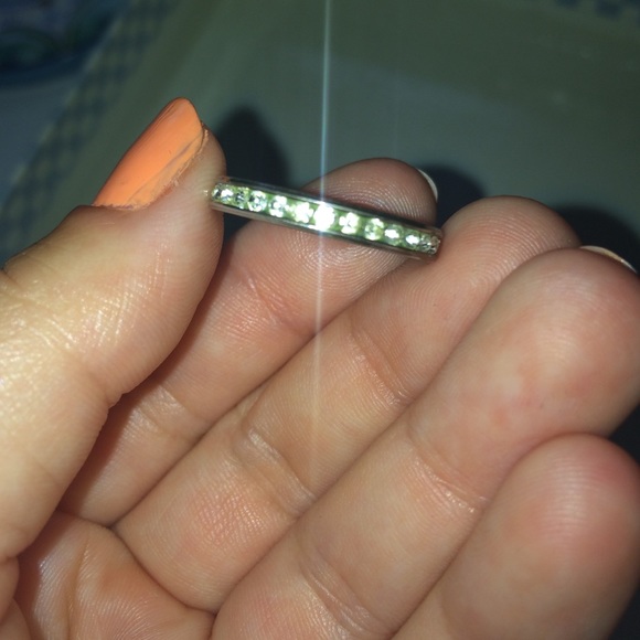 Silver colored ring with cubic zirconia diamonds