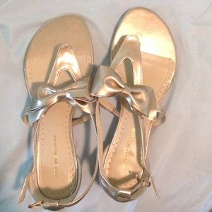 Gold bow sandals never worn