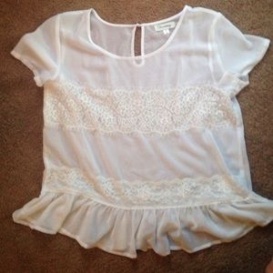 Sheer white top perfect to beat the heat in style