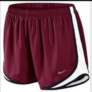 Maroon Nike running shorts