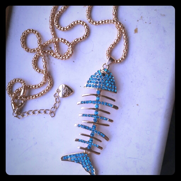 Betsey Johnson fish fossil necklace.