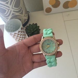 Teal and gold watch