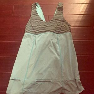 An adorable tank with a drawstring bottom.