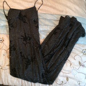 Brand new dark gray beaded evening gown.