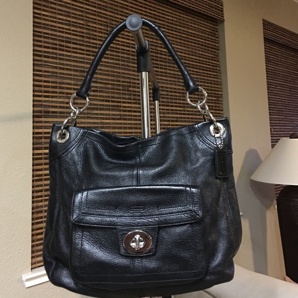 Black leather Coach shoulder bag.